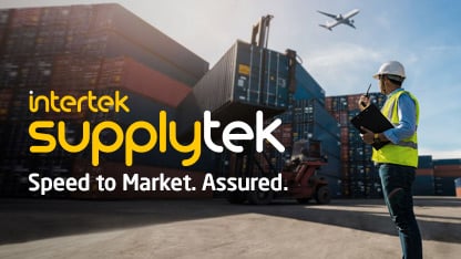 Man with safety vest and helmet monitoring cargo container transfer