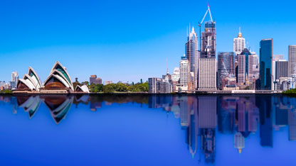 Sydney CBD skyline with reflection of buildings in the harbour waters