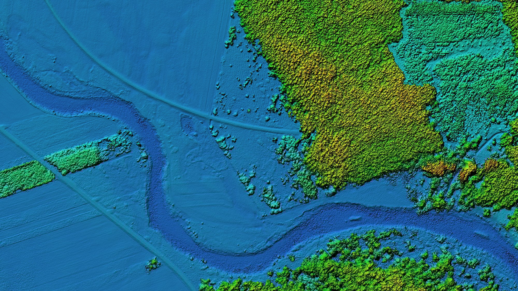 digital aerial view of river and land showing blue for water with green and yellow for land 
